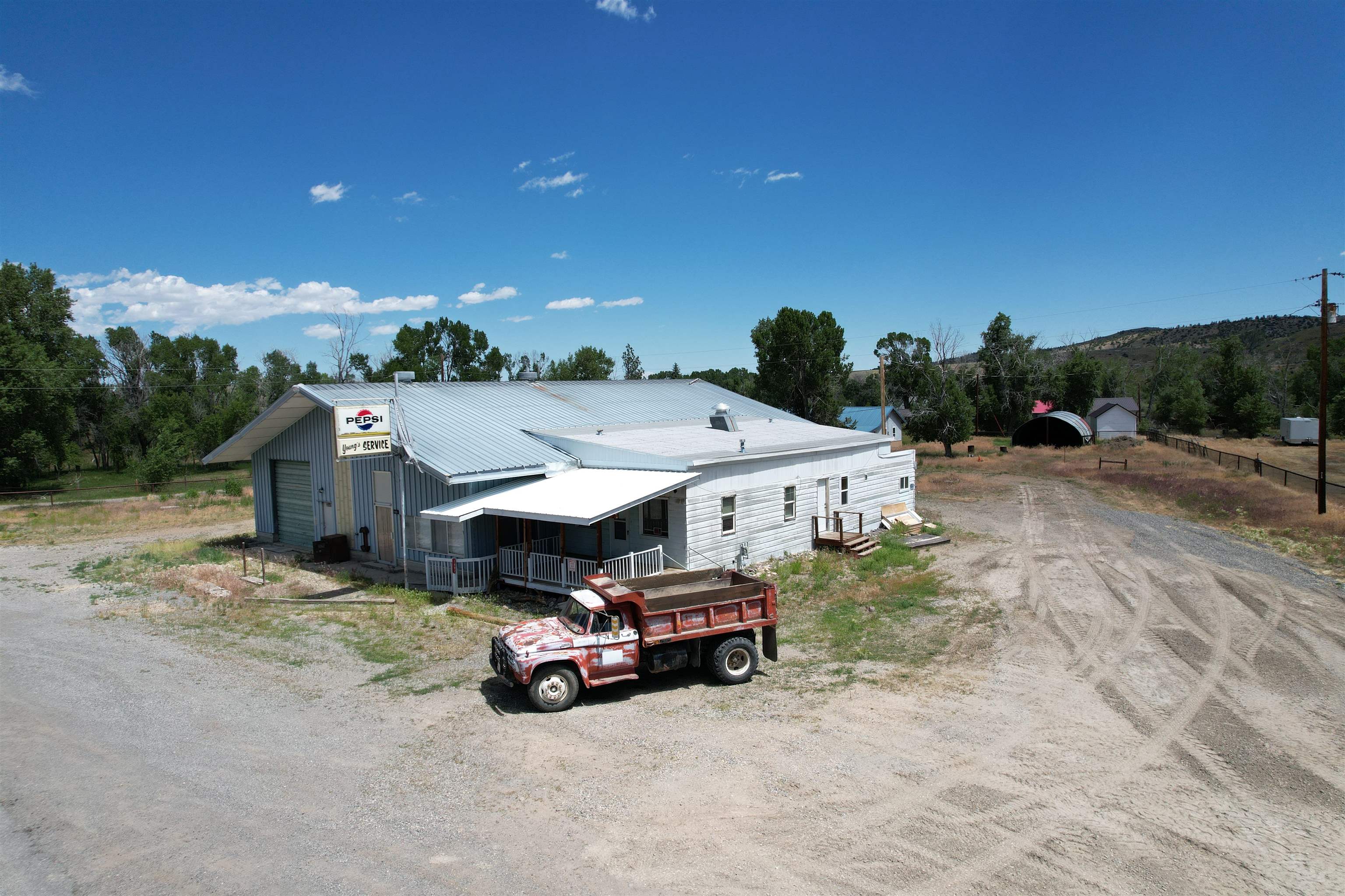 Highway Frontage Commercial Building – Renovation or Redevelopment Opportunity on 1.38 Acres, 1602 State Street, Meeteetse, WY 82433