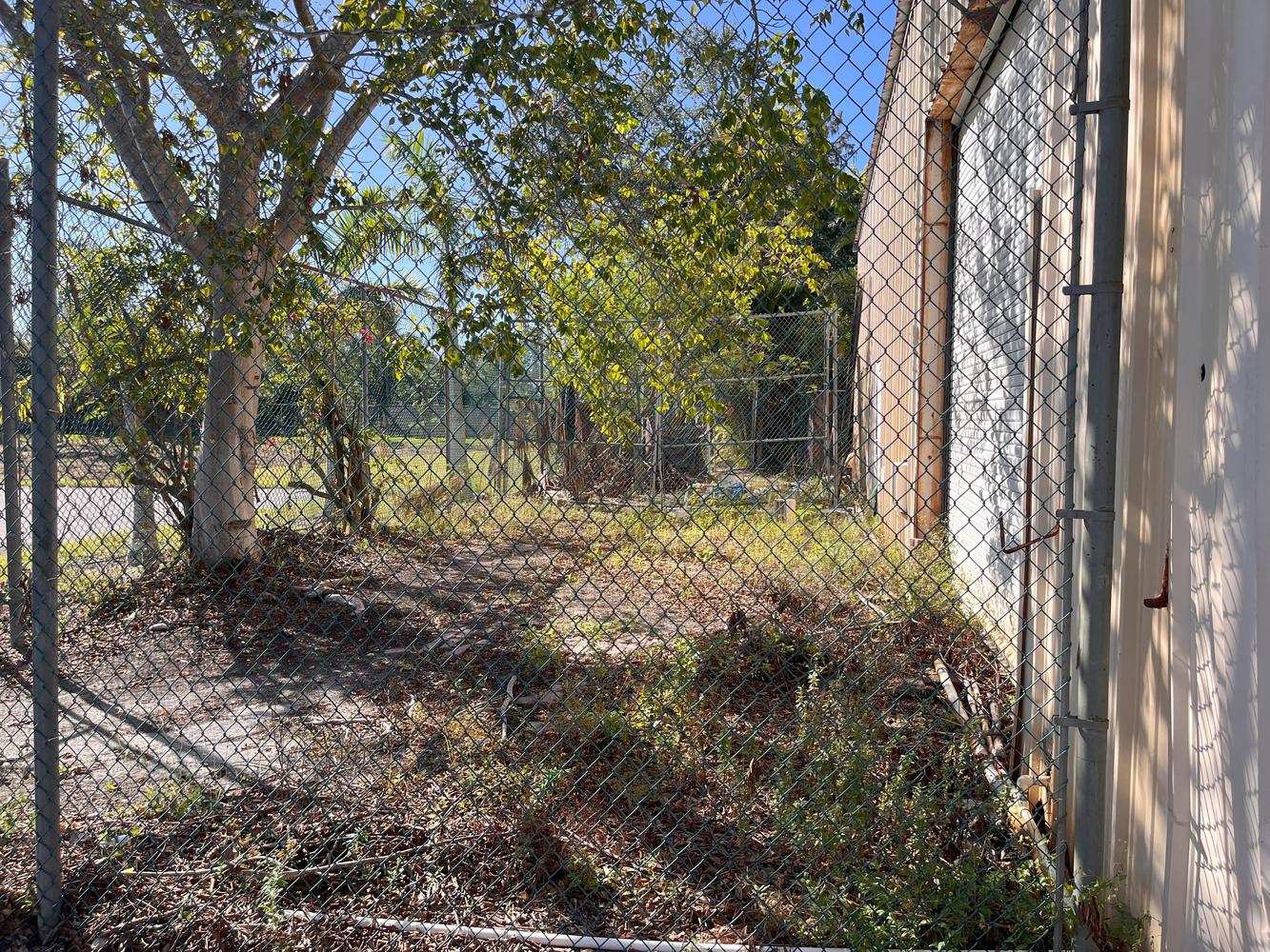 1/2 acre Fenced acreage w/ Bldg/Warehouse, 2719 N. Tamiami Trail, North Fort Myers, FL 33903