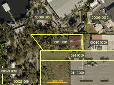 1/2 acre Fenced acreage w/ Bldg/Warehouse, 2719 N. Tamiami Trail, North Fort Myers, FL 33903