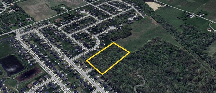 Providence at Stonegate's commons sits this wooded 6 acres