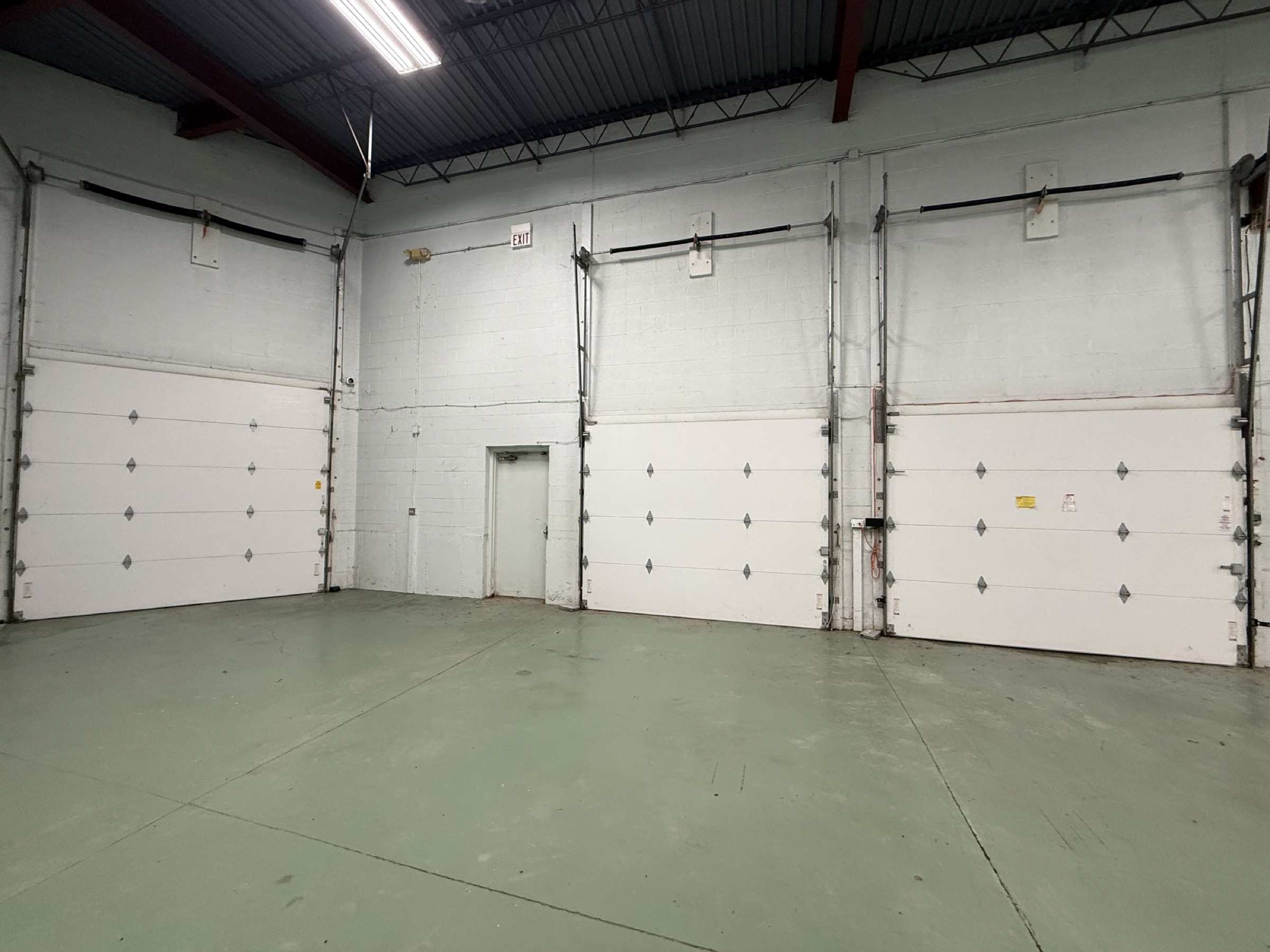 Load under roof: the truck pulls inside the building — Lease in Libertyville, IL, photo 5 of 8