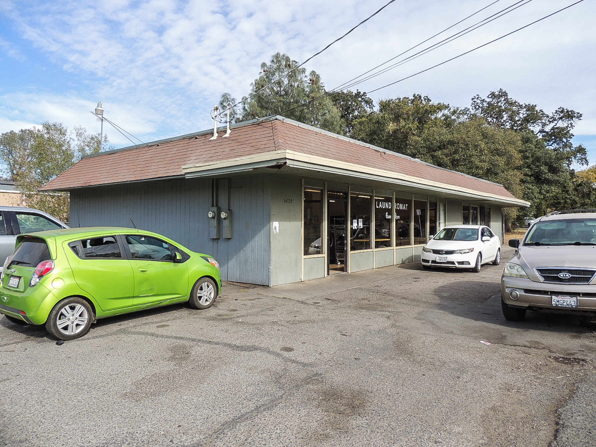 McKinney Building and Laundromats FOR SALE on 14320 Olympic Drive